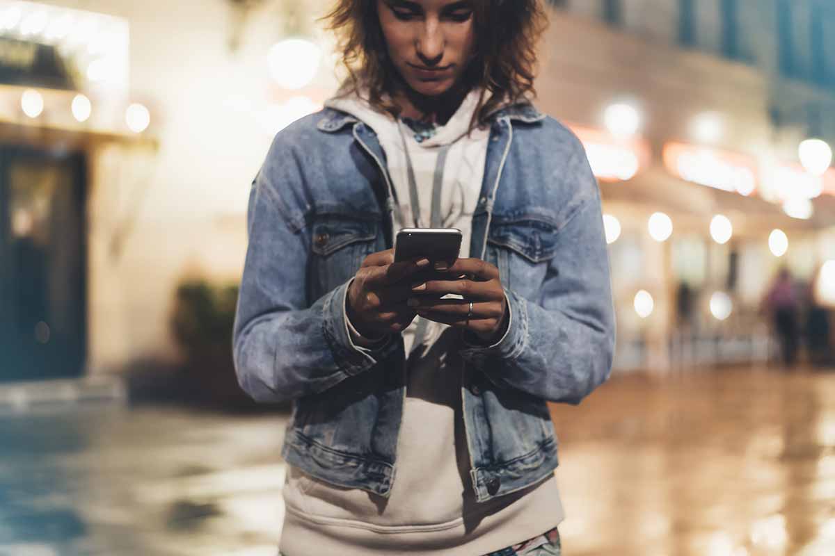 women on phone outside